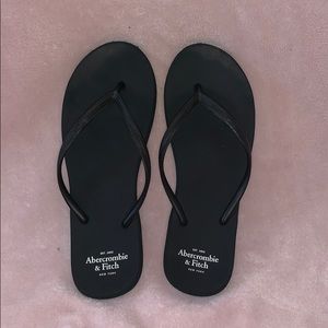 Black Abercrombie and Fitch flip flops
